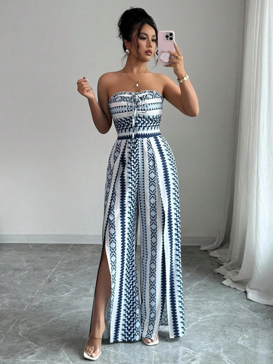 🌀 BE PERSTIJN 50% KORTING! 💥 Geometrisch jumpsuit met halterhals en split – Unieke print, elegante pasvorm, veelzijdige stijl ✨