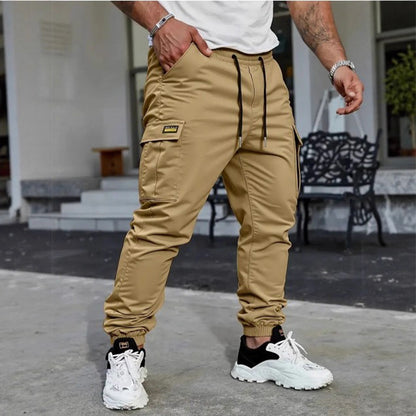 👖50% KORTING🏃 Werkkleding-joggingbroek | Trekkoord in de taille · Duurzaam polyester · Taps toelopende pijpen · Meerdere zakken