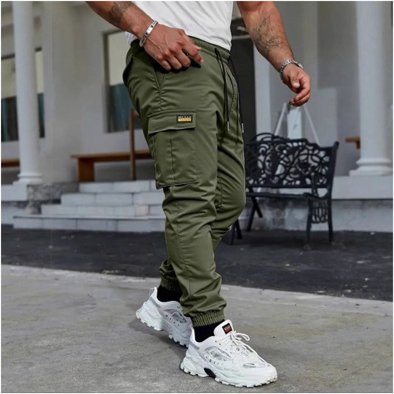 👖50% KORTING🏃 Werkkleding-joggingbroek | Trekkoord in de taille · Duurzaam polyester · Taps toelopende pijpen · Meerdere zakken
