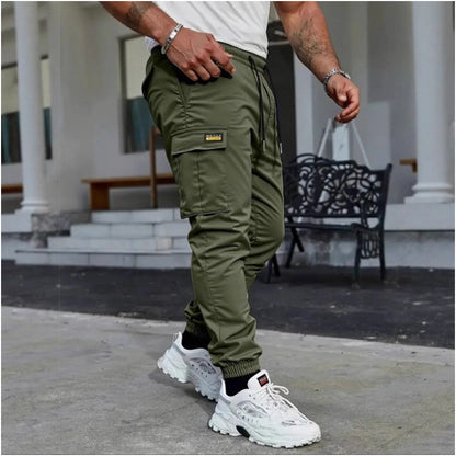 👖50% KORTING🏃 Werkkleding-joggingbroek | Trekkoord in de taille · Duurzaam polyester · Taps toelopende pijpen · Meerdere zakken