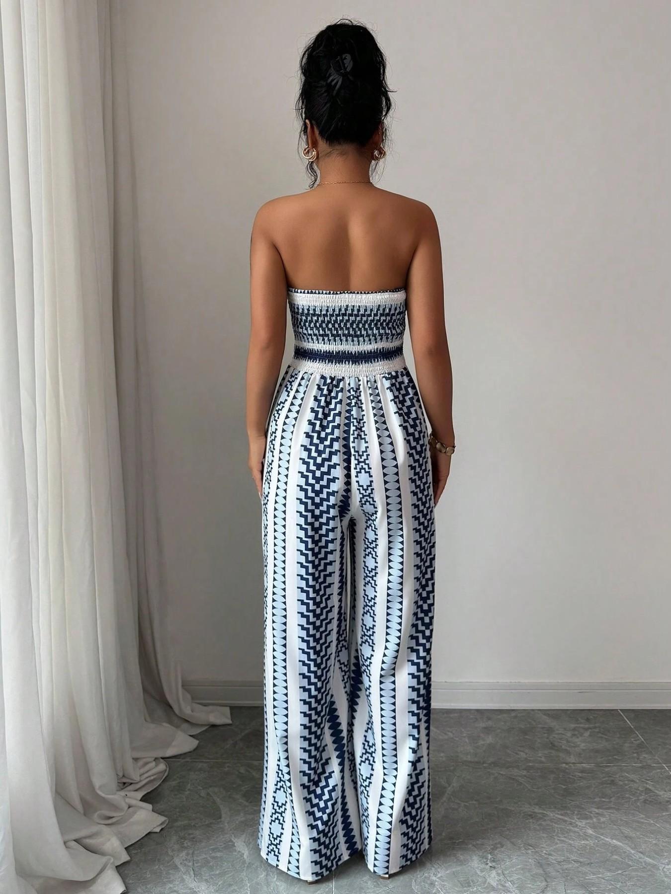 🌀 BE PERSTIJN 50% KORTING! 💥 Geometrisch jumpsuit met halterhals en split – Unieke print, elegante pasvorm, veelzijdige stijl ✨