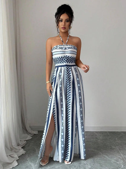 🌀 BE PERSTIJN 50% KORTING! 💥 Geometrisch jumpsuit met halterhals en split – Unieke print, elegante pasvorm, veelzijdige stijl ✨