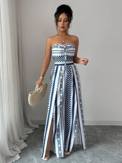 🌀 BE PERSTIJN 50% KORTING! 💥 Geometrisch jumpsuit met halterhals en split – Unieke print, elegante pasvorm, veelzijdige stijl ✨