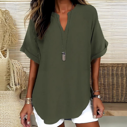 👚60% KORTING! 🔥Modieuze losse top met korte mouwen – V-hals met inkeping, asymmetrische zoom en lichtgewicht stof (5 kleuren, S–2XL) 🌸