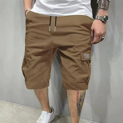 🥳HETE UITVERKOOP 2026🩳 60% KORTING! Lichtgewicht cargoshorts – Ademende stof, knielengte. Veilige zakken voor telefoon en sleutels. Comfortabel de hele dag door. ✅☀️