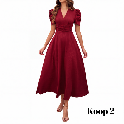 🥳2026 HOT UITVERKOOP🥳💞MEER DAN 50.000 VERKOCHT!💥💕🌿 50% KORTING! Elegante jurk met pofmouwen – V-hals en hoge taille creëren een zandloperfiguur. Ademend, kreukvrij. Perfect voor volwassen vrouwen. 👗✅