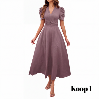 🥳2026 HOT UITVERKOOP🥳💞MEER DAN 50.000 VERKOCHT!💥💕🌿 50% KORTING! Elegante jurk met pofmouwen – V-hals en hoge taille creëren een zandloperfiguur. Ademend, kreukvrij. Perfect voor volwassen vrouwen. 👗✅