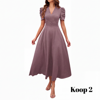 🥳2026 HOT UITVERKOOP🥳💞MEER DAN 50.000 VERKOCHT!💥💕🌿 50% KORTING! Elegante jurk met pofmouwen – V-hals en hoge taille creëren een zandloperfiguur. Ademend, kreukvrij. Perfect voor volwassen vrouwen. 👗✅