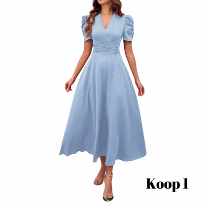 🥳2026 HOT UITVERKOOP🥳💞MEER DAN 50.000 VERKOCHT!💥💕🌿 50% KORTING! Elegante jurk met pofmouwen – V-hals en hoge taille creëren een zandloperfiguur. Ademend, kreukvrij. Perfect voor volwassen vrouwen. 👗✅