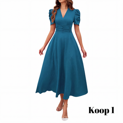 🥳2026 HOT UITVERKOOP🥳💞MEER DAN 50.000 VERKOCHT!💥💕🌿 50% KORTING! Elegante jurk met pofmouwen – V-hals en hoge taille creëren een zandloperfiguur. Ademend, kreukvrij. Perfect voor volwassen vrouwen. 👗✅