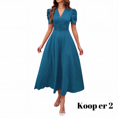 🥳2026 HOT UITVERKOOP🥳💞MEER DAN 50.000 VERKOCHT!💥💕🌿 50% KORTING! Elegante jurk met pofmouwen – V-hals en hoge taille creëren een zandloperfiguur. Ademend, kreukvrij. Perfect voor volwassen vrouwen. 👗✅