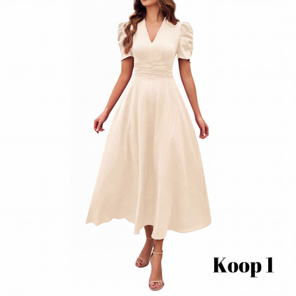 🥳2026 HOT UITVERKOOP🥳💞MEER DAN 50.000 VERKOCHT!💥💕🌿 50% KORTING! Elegante jurk met pofmouwen – V-hals en hoge taille creëren een zandloperfiguur. Ademend, kreukvrij. Perfect voor volwassen vrouwen. 👗✅