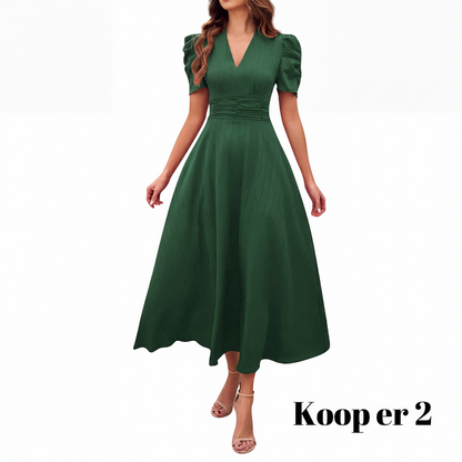 🥳2026 HOT UITVERKOOP🥳💞MEER DAN 50.000 VERKOCHT!💥💕🌿 50% KORTING! Elegante jurk met pofmouwen – V-hals en hoge taille creëren een zandloperfiguur. Ademend, kreukvrij. Perfect voor volwassen vrouwen. 👗✅