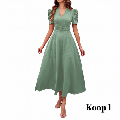 🥳2026 HOT UITVERKOOP🥳💞MEER DAN 50.000 VERKOCHT!💥💕🌿 50% KORTING! Elegante jurk met pofmouwen – V-hals en hoge taille creëren een zandloperfiguur. Ademend, kreukvrij. Perfect voor volwassen vrouwen. 👗✅