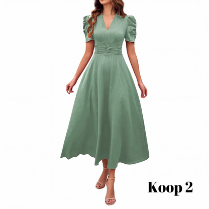 🥳2026 HOT UITVERKOOP🥳💞MEER DAN 50.000 VERKOCHT!💥💕🌿 50% KORTING! Elegante jurk met pofmouwen – V-hals en hoge taille creëren een zandloperfiguur. Ademend, kreukvrij. Perfect voor volwassen vrouwen. 👗✅